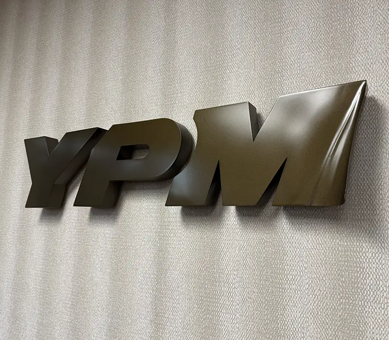YPM wall insignia