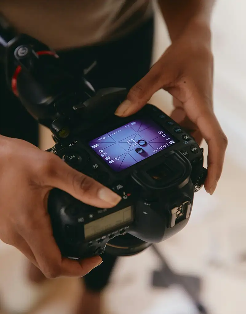 adjusting settings on a camera