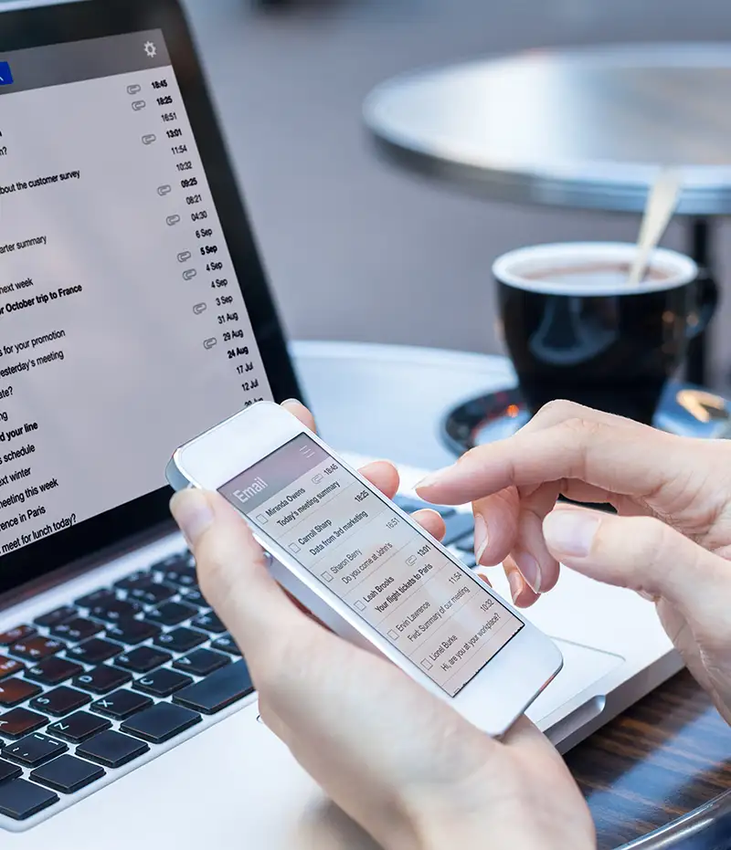 person checking email on their phone