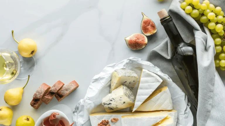 wine and cheese spread on table