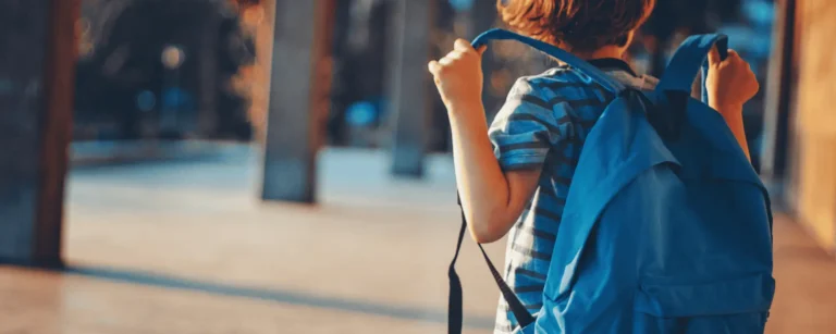 child with backpack
