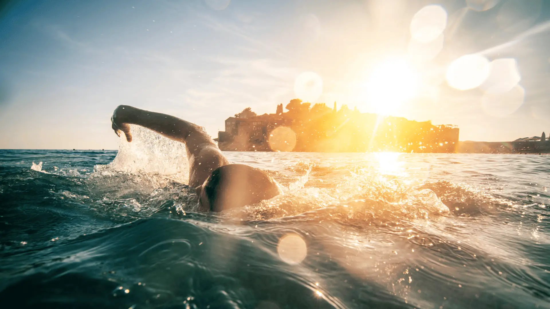 person swimming in the ocean