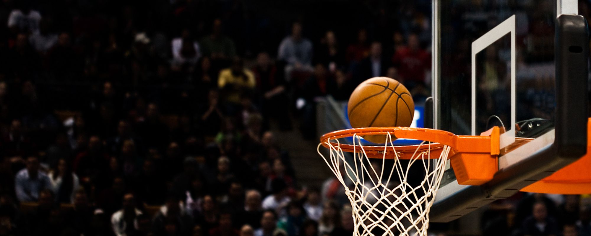 basketball going into the hoop
