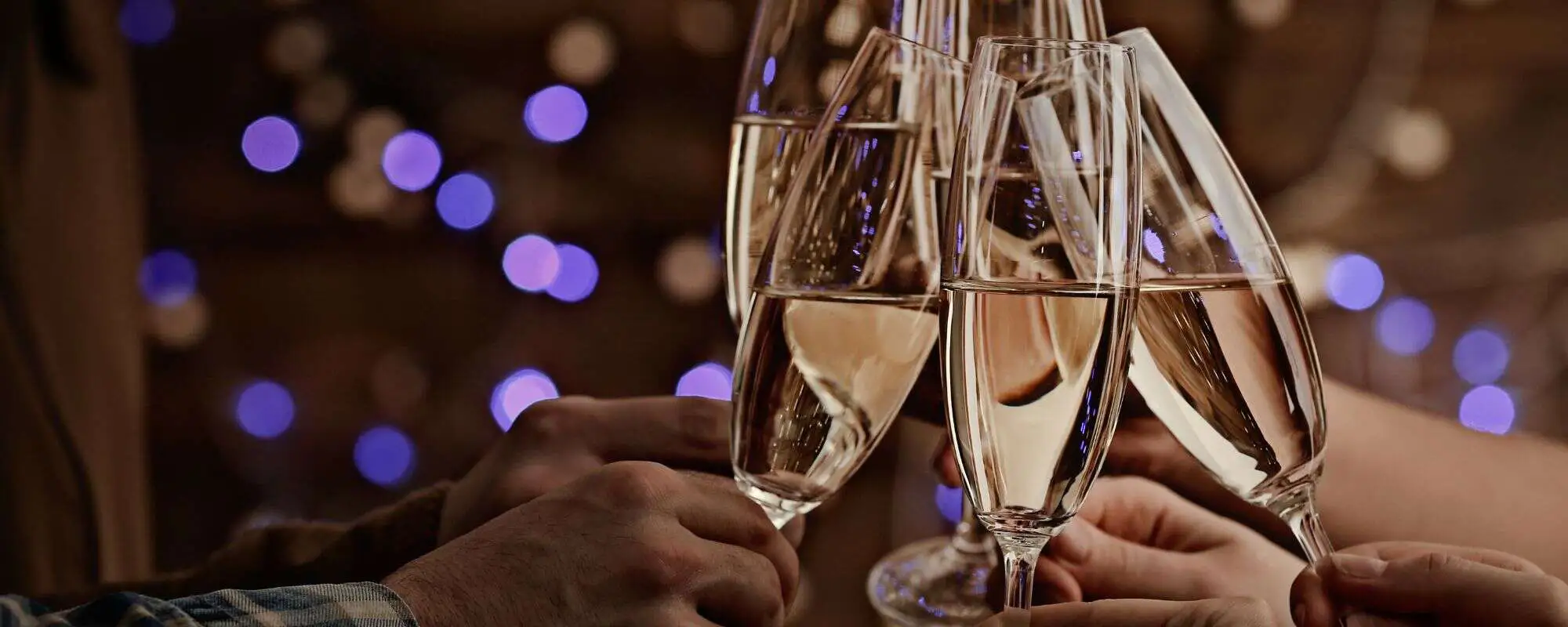 people toasting with champagne glasses